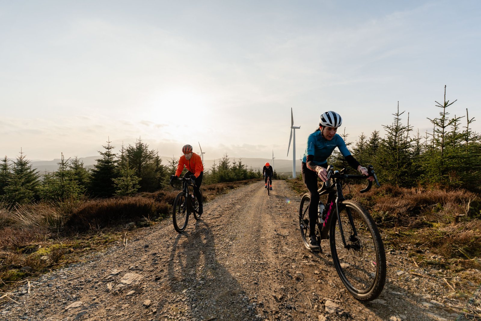 Riders on exposed gravel above Royal Deeside